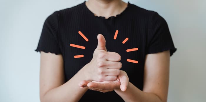 An image of a girl using ASL Alphabets