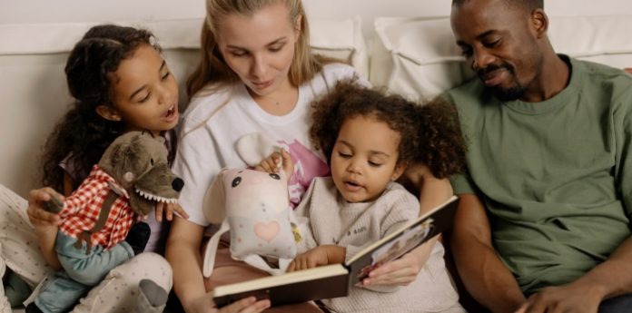 Image of parents reading storybooks with kids