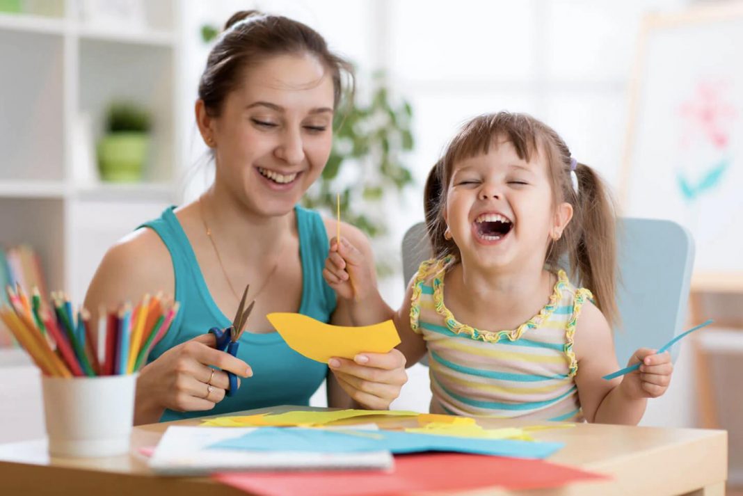 Mother and child engaging in art and craft