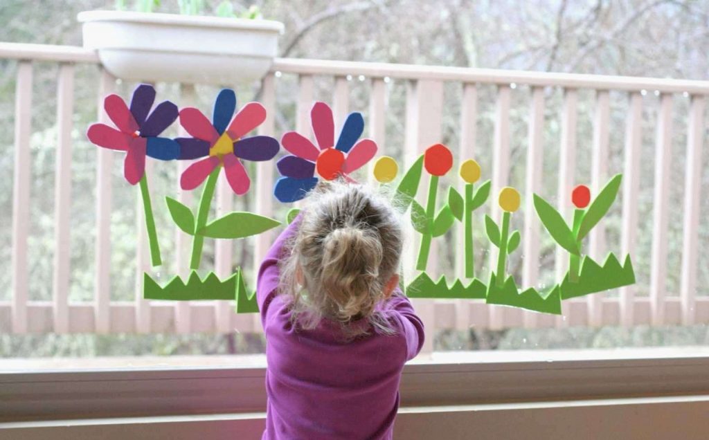 Kid painting window