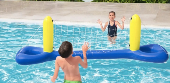 Kids playing water volley ball