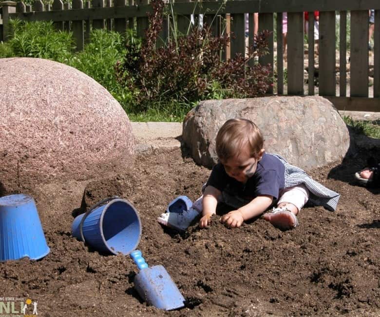 Kid playing in the dirt