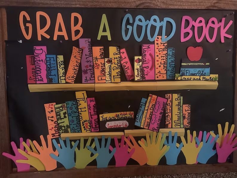 Colorful bulletin board with a Grab a Good Book theme