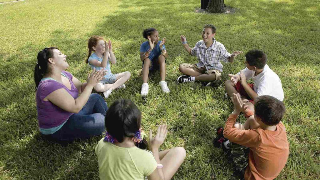 Kids sitting in a circle