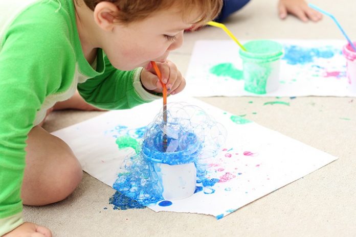 Preschooler doing art