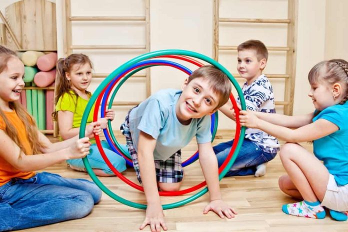 Kids playing with hula hoop