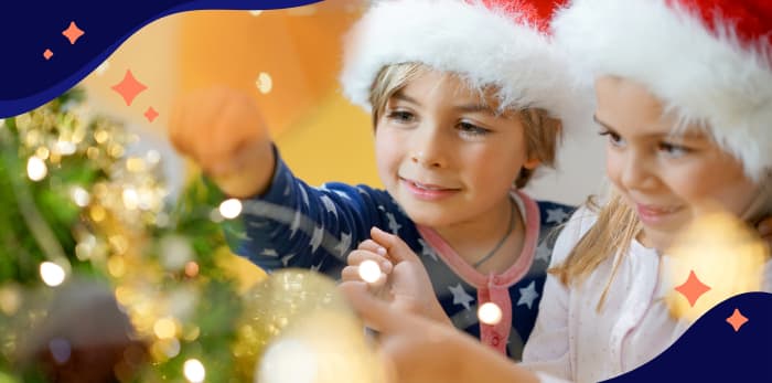 An image of a kid decorating for christmas